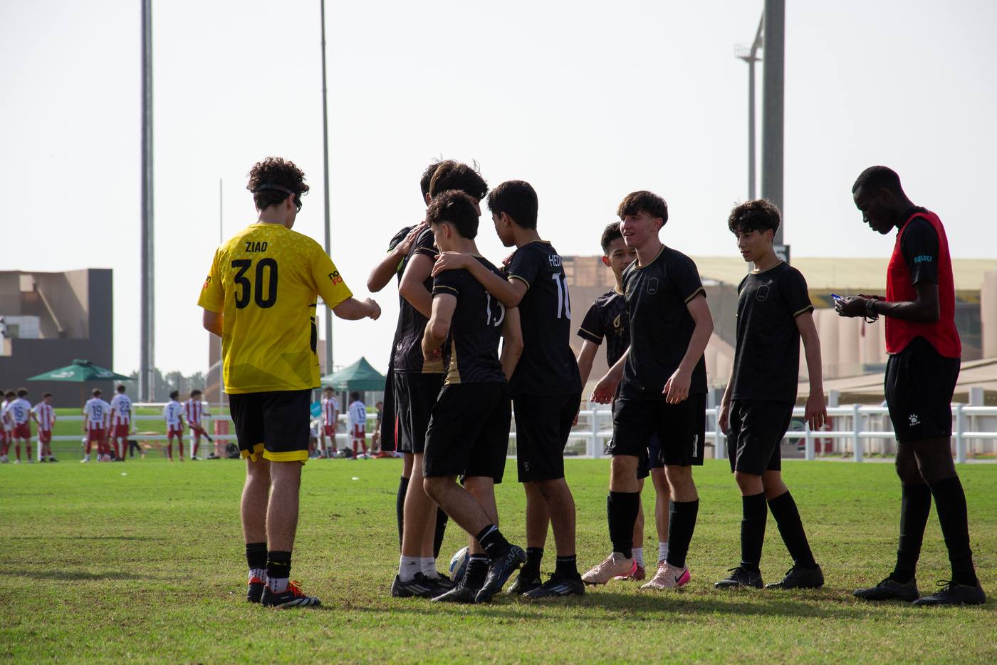 Origin FC team huddle before competitive league match